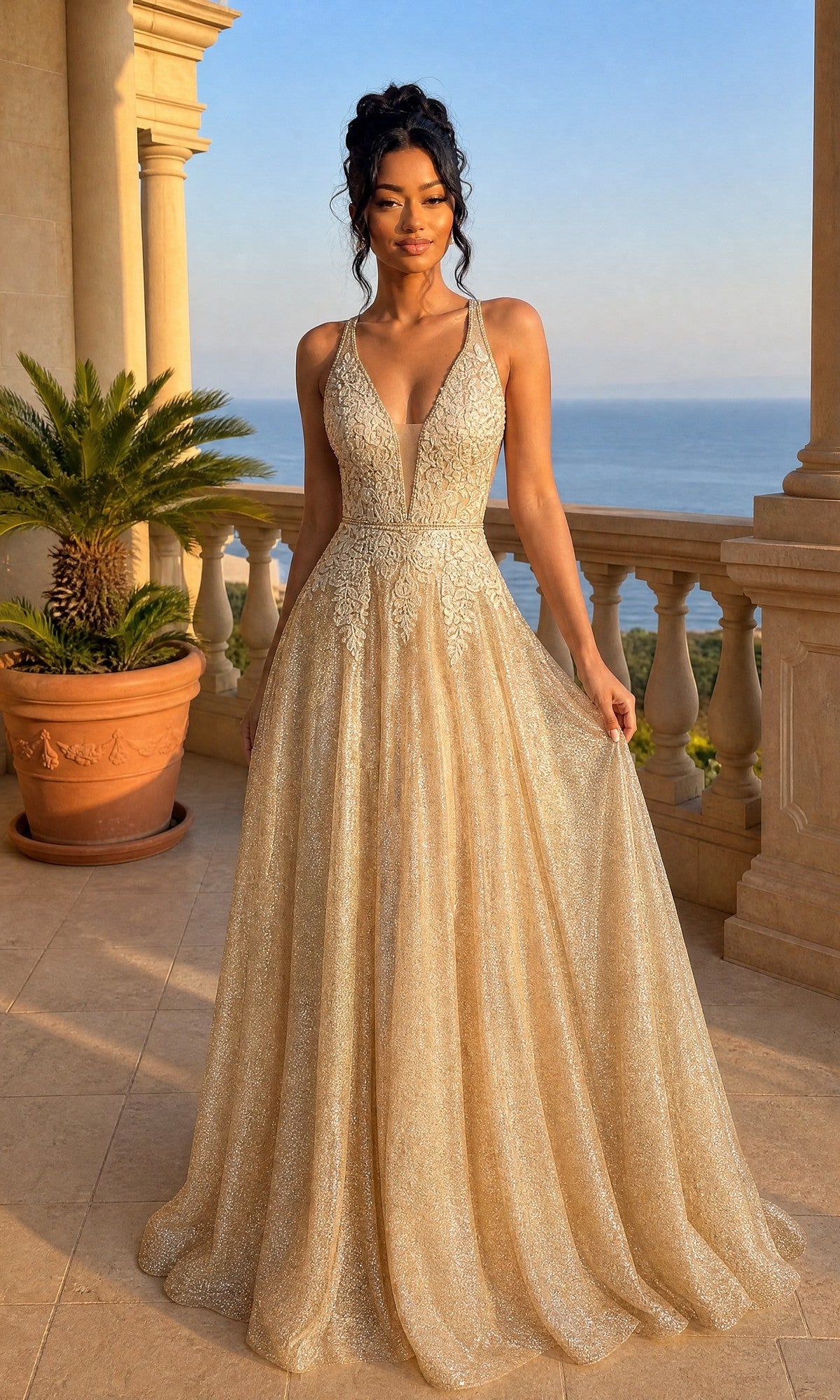 A woman in the Long Prom Dress: Chicas C2425, featuring a champagne gold, sparkly finish, deep V neckline, and flowing a-line skirt, stands on a balcony with ocean and palm trees in the background.